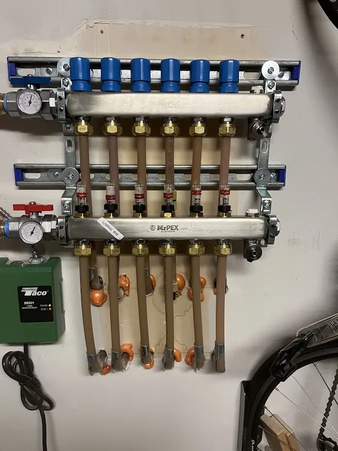 Plumber performing Gas Line Installation at a residential property in Carver